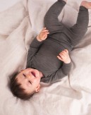 Baby bodysuit with long sleeves and american closure for in 100% organic merino wool