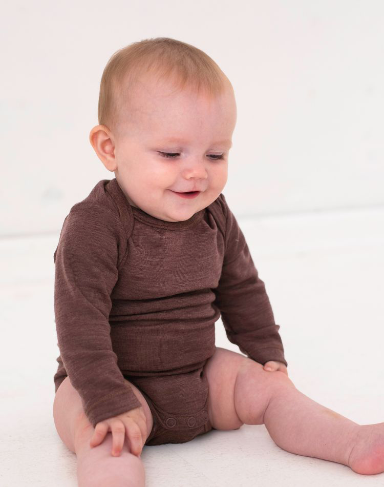 Baby bodysuit with long sleeves and american closure for in 100% organic merino wool